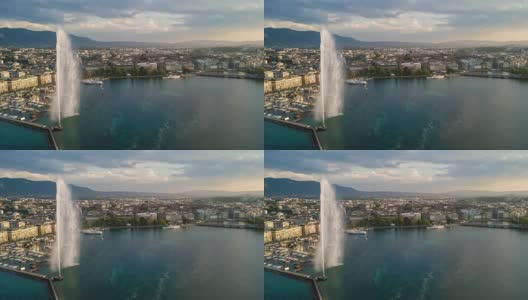 阳光明媚的日落日内瓦湖湾著名的喷泉城市景观空中全景4k时间流逝瑞士高清在线视频素材下载