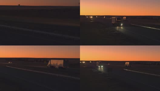 天线:货车在高速公路上行驶，在日出时运送货物高清在线视频素材下载