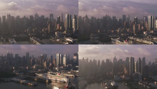 日出时分飞上哈德逊河与曼哈顿的建筑和码头。高清在线视频素材下载