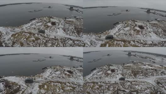 鸟瞰图的汽车驾驶到水边在冬天高清在线视频素材下载