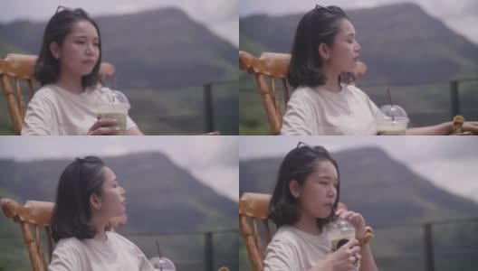 美丽的女人喝茶。高清在线视频素材下载