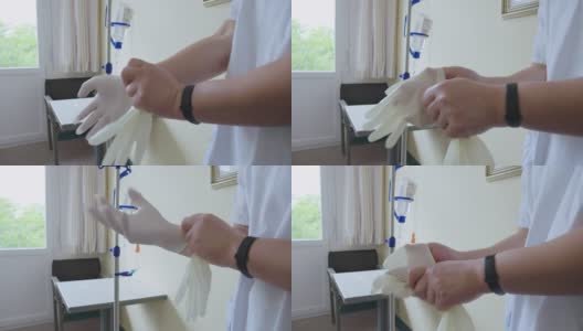 护士在病房里戴手术手套高清在线视频素材下载