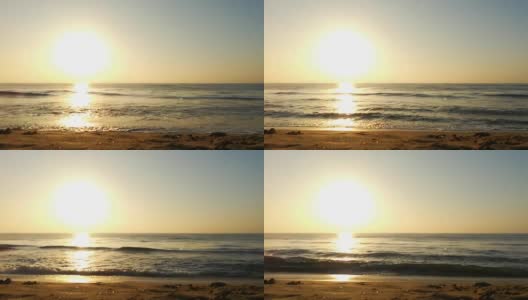 海面上的日出景观。海滩上金色的日出。海洋的日出。海面上的日出景观。海滩上金色的日出。橙色的日出。高清在线视频素材下载