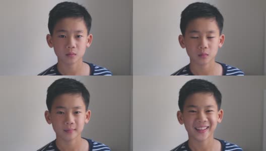 一张快乐、自信、健康的亚洲混血儿十多岁男孩的大头照高清在线视频素材下载
