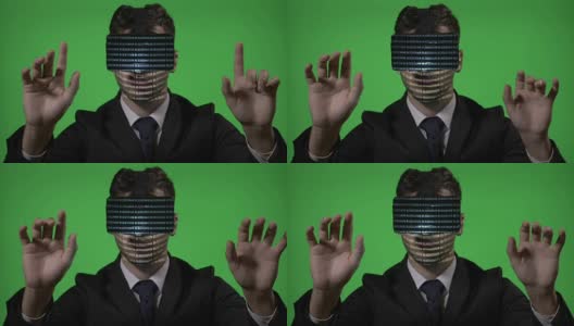 西装革履的男工程师使用未来虚拟现实技术在绿色屏幕上输入和检查区块链数据高清在线视频素材下载