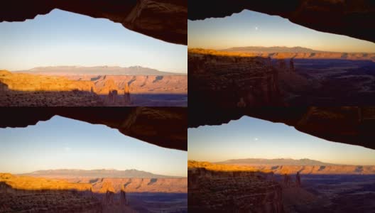 梅萨拱门峡谷地日落满月在山上高清在线视频素材下载