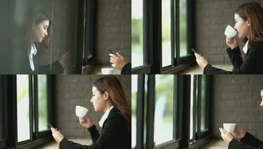 肖像迷人的年轻亚洲女人喝咖啡在咖啡店。高清在线视频素材下载