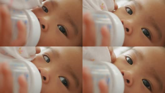 婴儿奶瓶喂养高清在线视频素材下载