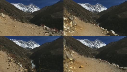 尼泊尔。徒步攀登珠峰大本营。背景是雪山珠穆朗玛峰。4 k高清在线视频素材下载