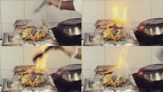 传统木炭烤架上的虎虾高清在线视频素材下载