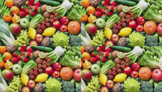 以各种新鲜有机水果和蔬菜为背景高清在线视频素材下载