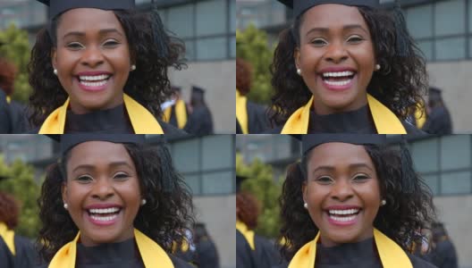 美丽的非裔美国女大学毕业生穿着毕业礼服和学位帽对着镜头微笑着露出牙齿高清在线视频素材下载