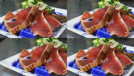 生金枪鱼，金枪鱼寿司和传统的日本菜沙拉切片高清在线视频素材下载