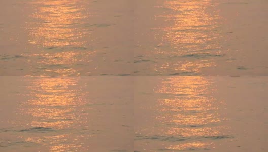 美丽的红色日落在海上。海面上红日的光芒高清在线视频素材下载