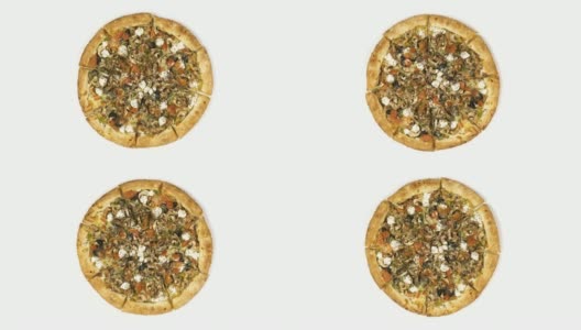 旋转披萨与烟熏香肠和橄榄在白色的背景。俯视图中心方向高清在线视频素材下载