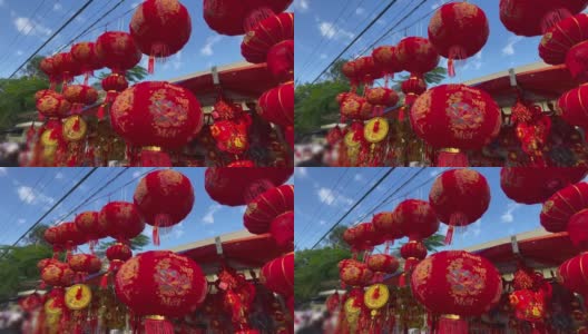 春节假期或农历新年前，亚洲街头市场上出售的五颜六色的红色和金色的中国灯笼。春节的概念。到亚洲旅行高清在线视频素材下载