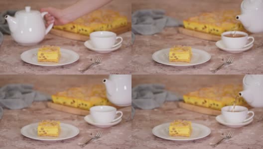 波兰芝士蛋糕分层格子图案杯茶倒茶入杯高清在线视频素材下载