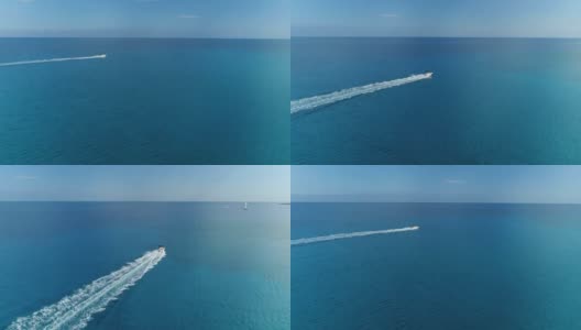 在塞浦路斯阿伊纳帕尼西海滩的地中海上，急躁地开动汽艇。空中无人机拍摄。高清在线视频素材下载