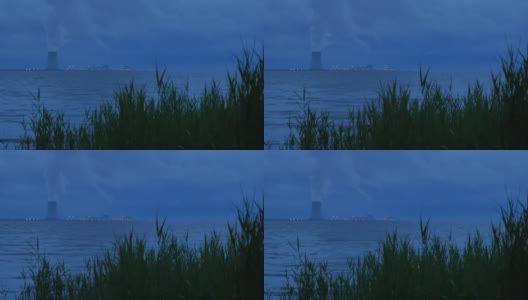 核动力冷却塔黄昏与海草中4k高清在线视频素材下载