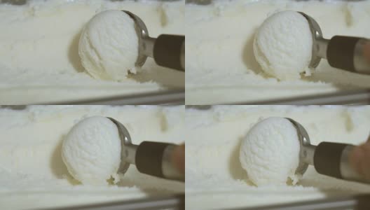 香草冰淇淋被挖出来了。特写镜头。高清在线视频素材下载