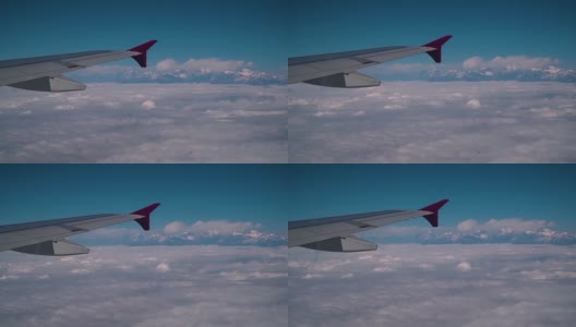 飞机机翼下的云和喜马拉雅山高清在线视频素材下载