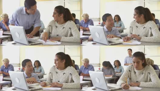 老师在课堂上使用笔记本电脑的高中生高清在线视频素材下载