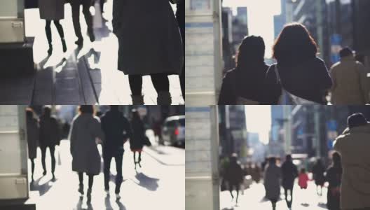 模糊拍摄的匿名日本人走在美丽的阳光十字路口和步行街在东京高清在线视频素材下载
