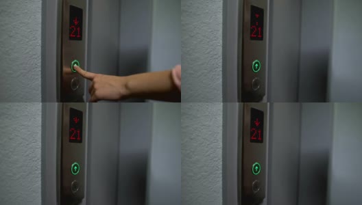 手指按电梯按钮到上层，电子液晶显示，特写高清在线视频素材下载