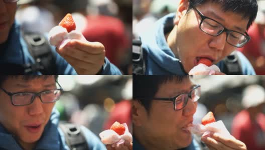 亚洲男子吃日本甜点大福草莓麻糬高清在线视频素材下载
