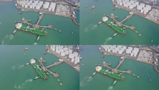 鸟瞰图拖船拖油船装载码头为运输石油或能源的概念背景。高清在线视频素材下载