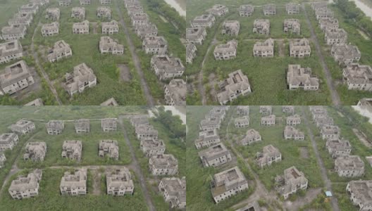 废弃的未完工的建筑，鬼城与杂草丛生的住房问题高清在线视频素材下载