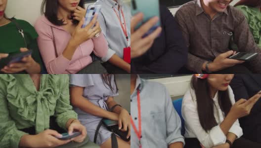 年轻人在公共地铁上使用手机高清在线视频素材下载