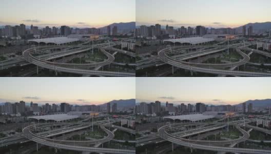 日落时城市高架立交桥的高角度视图，实时拍摄高清在线视频素材下载