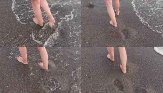 在沙滩上赤脚行走的女人慢动作。高清在线视频素材下载