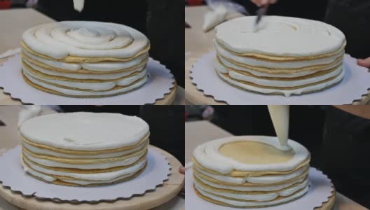 糕点师将奶油涂在多层蛋糕上，然后用刀使其均匀高清在线视频素材下载