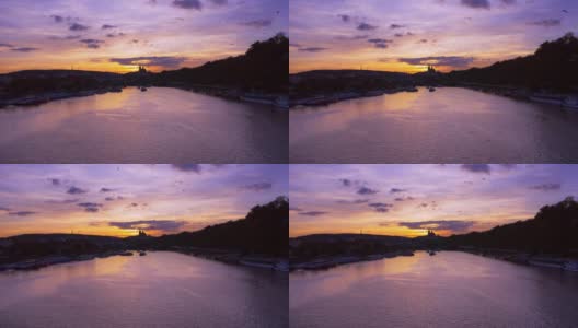 日落时分的布拉格伏尔塔瓦河和赫拉德卡尼山高清在线视频素材下载