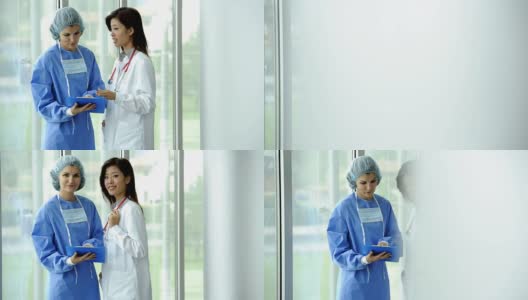 女性医生和外科医生咨询;HD:照片JPEG，多莉高清在线视频素材下载