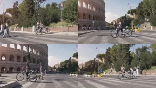 年轻美丽的女子游客在罗马市中心斗牛场过马路在阳光明媚的一天慢镜头汽车稳定摄影机高清在线视频素材下载