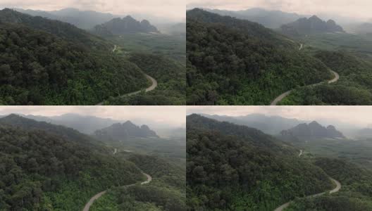 山区弯道4k鸟瞰图和移动拍摄。高清在线视频素材下载