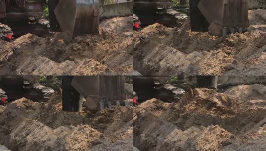 挖掘机铲斗挖土高清在线视频素材下载