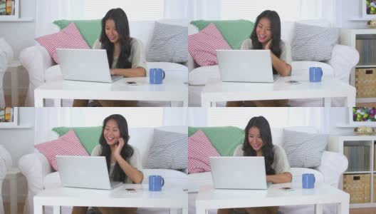 可爱的日本女人使用笔记本电脑高清在线视频素材下载