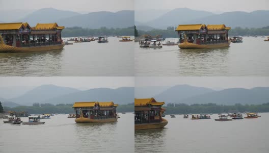 北京颐和园龙舟画舫 Touristic boat navigating into the lake in the Summer City in Beijing高清在线视频素材下载