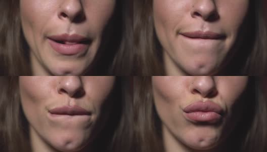 女人舔着粉红色的嘴唇亲吻，特写高清在线视频素材下载