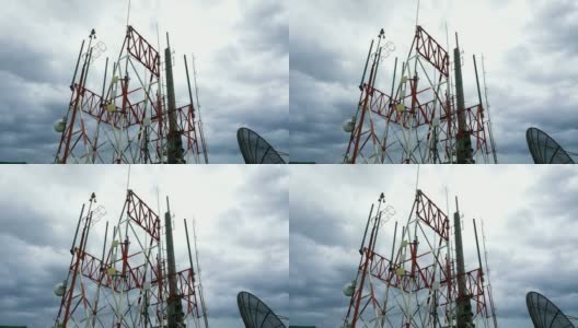 红白相间的电信塔映衬着蔚蓝的天空高清在线视频素材下载