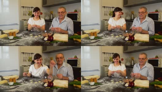 父亲和女儿使佩尔梅尼和微笑高清在线视频素材下载