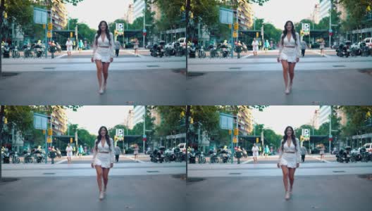 年轻时尚的亚洲女孩在大城市的街道上的肖像高清在线视频素材下载
