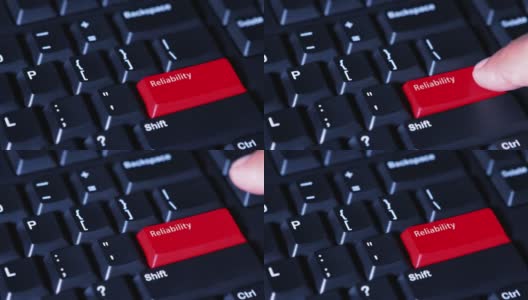 视频画面显示，男性手指按下了电脑键盘上红色的“可靠性”按钮高清在线视频素材下载