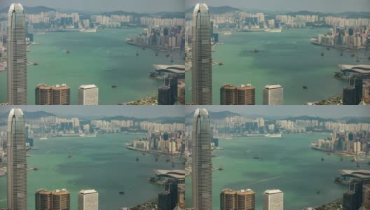 日光香港城市景观著名的维多利亚港空中全景，4k时间推移高清在线视频素材下载