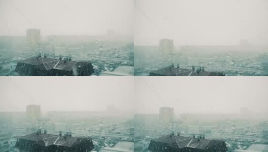 现代城市的恶劣天气和窗外的大雪景象高清在线视频素材下载