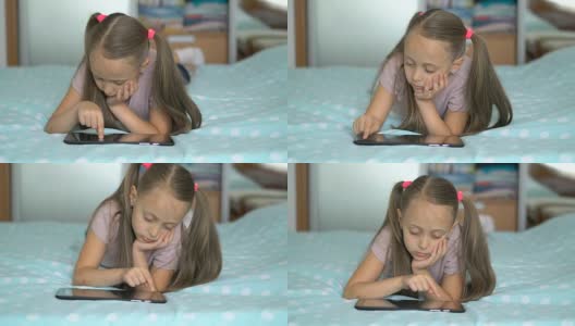 小女孩在家玩平板电脑高清在线视频素材下载